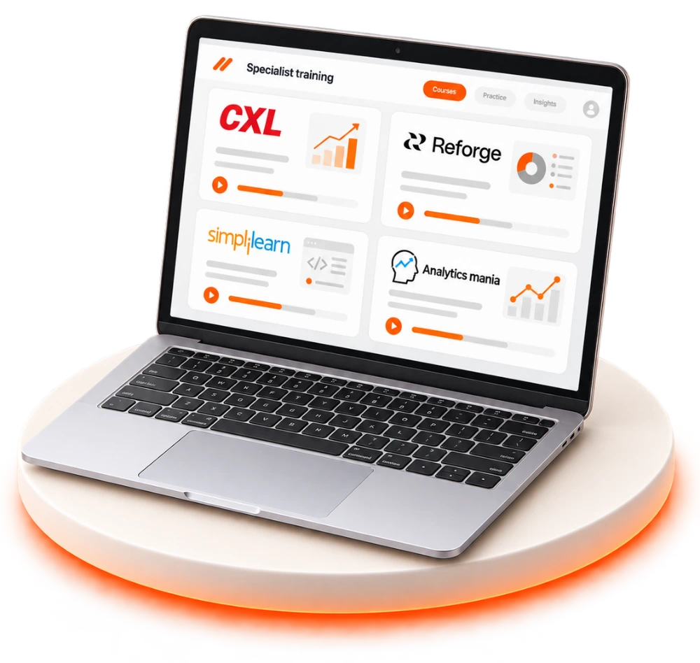 A laptop on a raised platform showing a specialist training library, with course cards for CXL, Reforge, Simplilearn and Analytics Mania.
